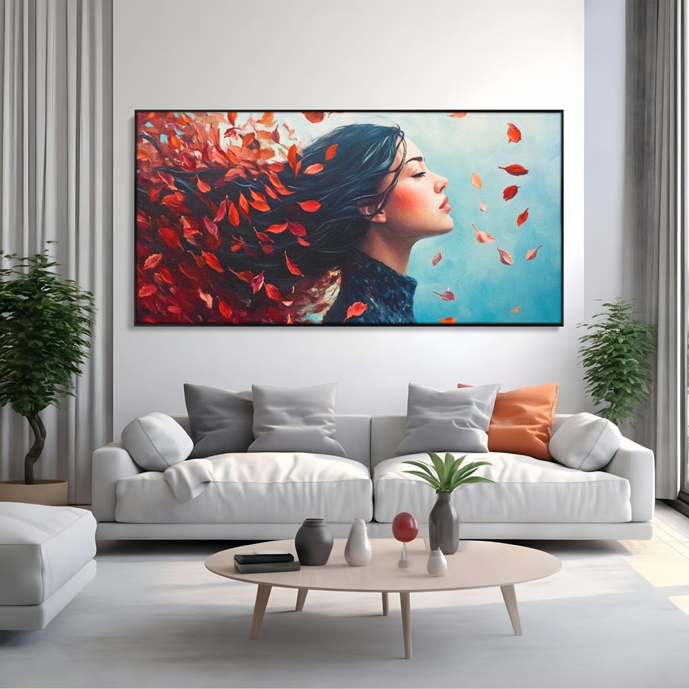 Tablou canvas cu tablou canvas cu femeie si frunze in vant, in rama de aluminiu negru, pe perete intr-un living